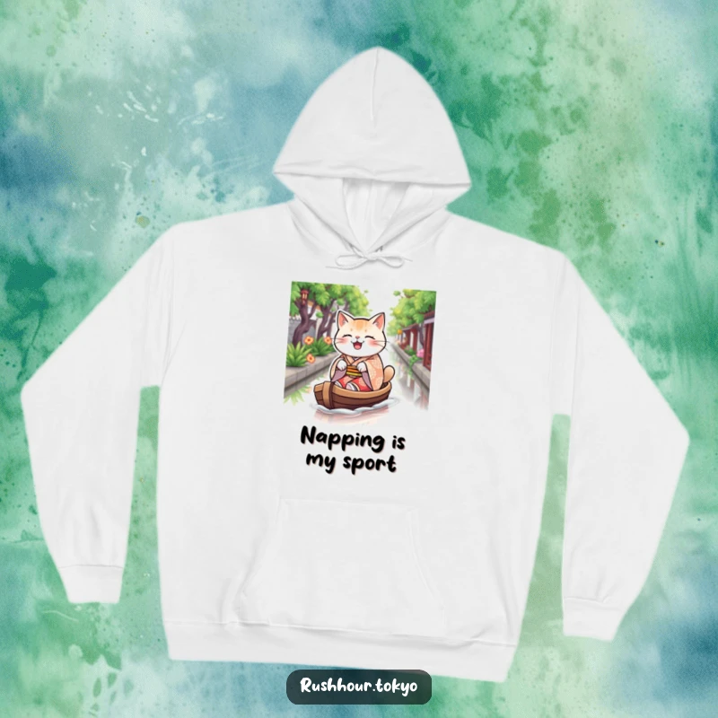 Funny cat in a patterned kimono joyfully rowing a boat on a canal, featured on a warm and cozy hoodie.