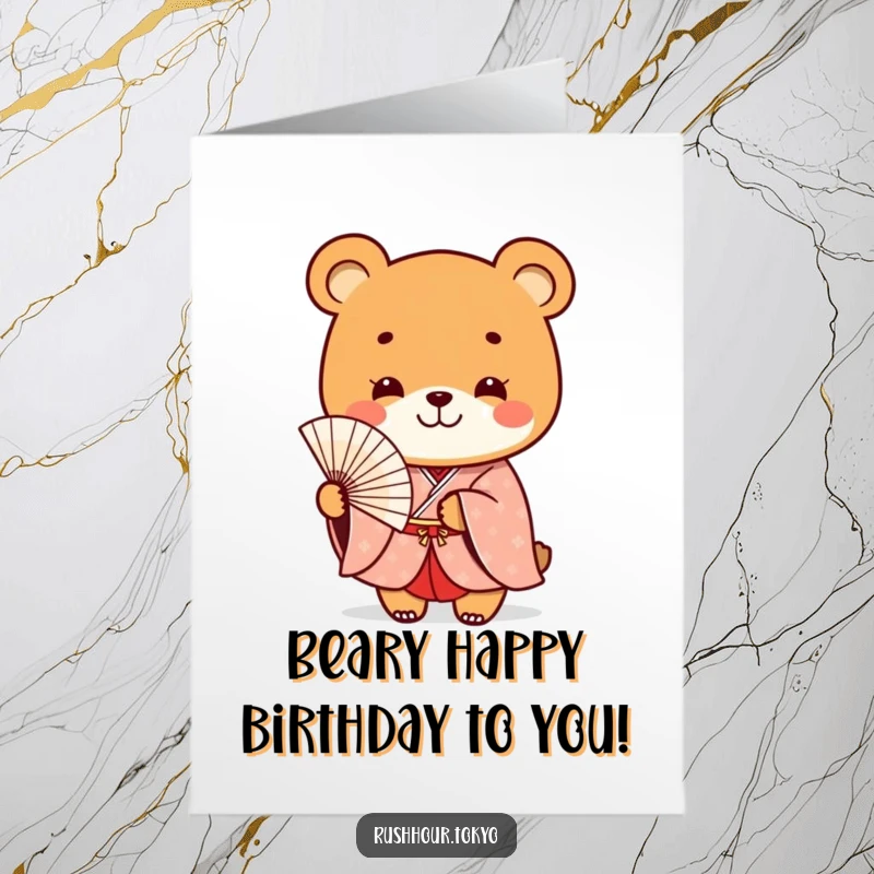 Funny Free Printable birthday card showing a playful bear character in a formal kimono smiling while holding a delicate fan.